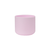 Bottle Boot 24oz in light pink silicone; small cylindrical form