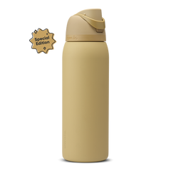 FreeSip 40oz Autumn Vista; warm golden sand body with matching tan flip cap, lighter cream-tan carry loop, and tan lid