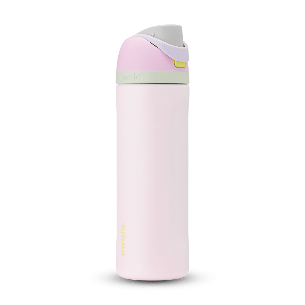 FreeSip 24oz water bottle, soft blush pink body with pale pink and sage green color-block flip cap