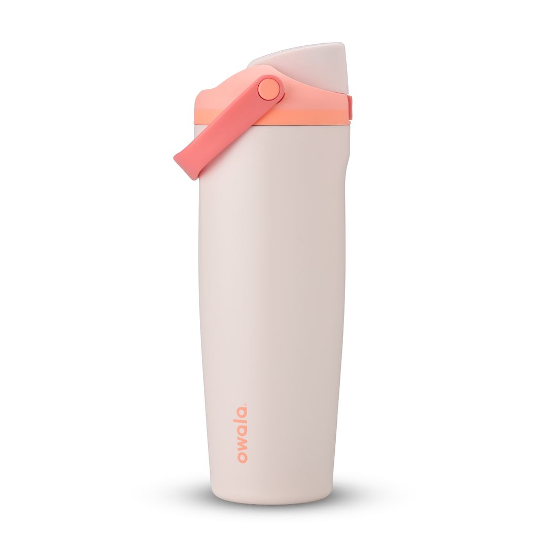 FreeSip Sway 32oz, light cream white tumbler with coral peach flip cap and carry loop