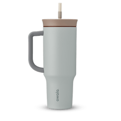 40oz Tumbler in Calm Waters, pale icy blue insulated tumbler with grey handle, taupe lid, and cream straw