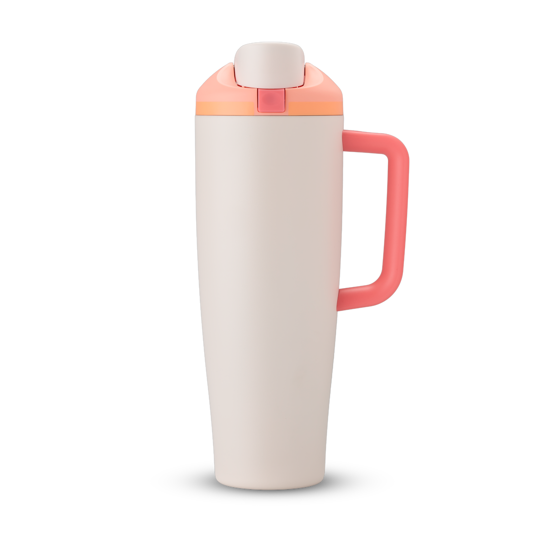 FreeSip Tumbler 40oz in Sparkling Sherbet — cream white body with coral pink lid and handle, viewed from the handle side