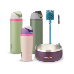 Family Bundle with accessories; two tall FreeSip water bottles in green and pink-mauve, a Kids Tumbler in pink-mauve with teal lid, a purple Pet Bowl with stainless rim, and a blue bottle brush