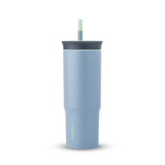 24oz Tumbler in Lost Valley; matte denim-blue insulated tumbler with dark slate-gray lid, mint green accent ring, and matching mint green straw, Owala wordmark on front