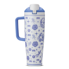 Heirloom 40oz Tumbler with handle; white body with blue delft-style illustrated pattern of stars, flowers, and charms; periwinkle blue handle and lid