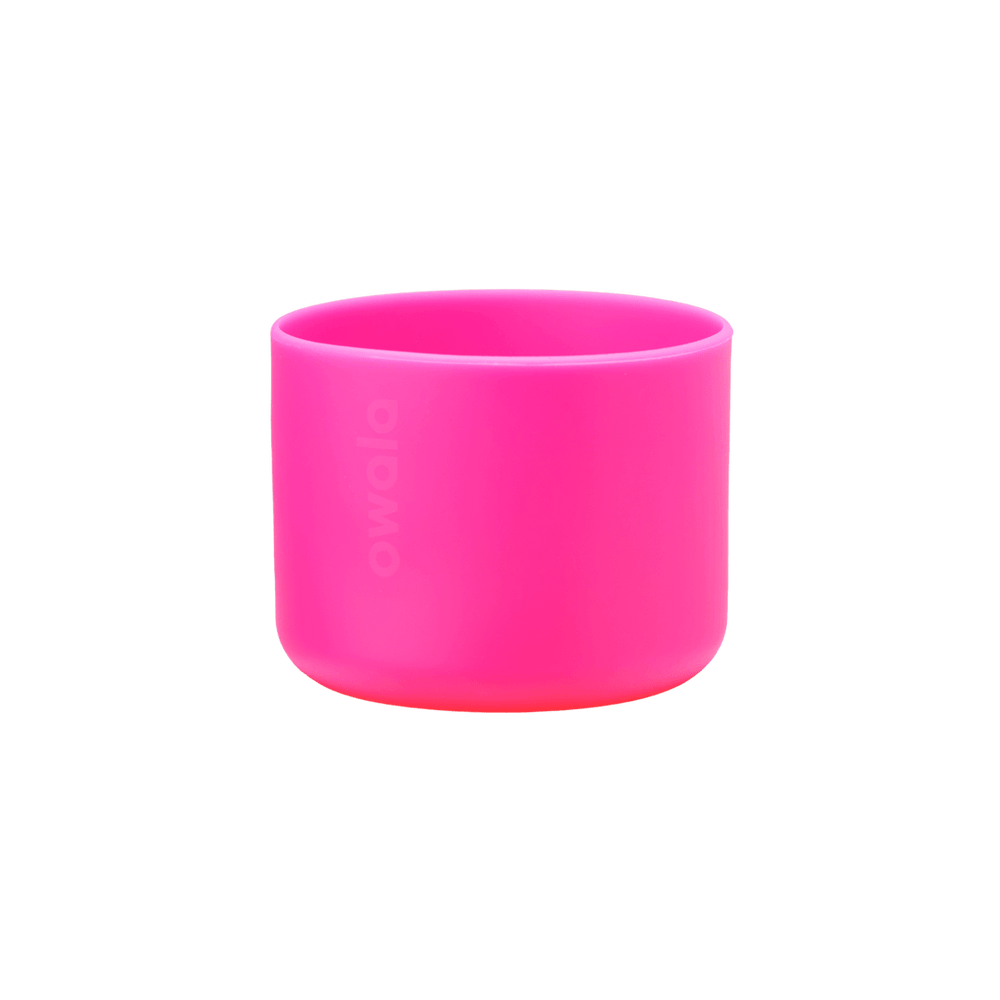 Owala Bottle Boot in vivid hot pink silicone with tonal Owala logo, wide short cylindrical form sized for the 32oz bottle
