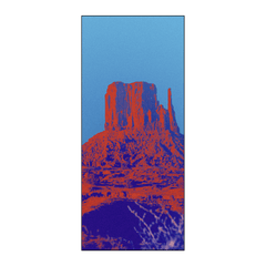 Owala Beach Towel in Wild Wild West; vibrant pop-art red and orange desert rock formation print on a bright blue background